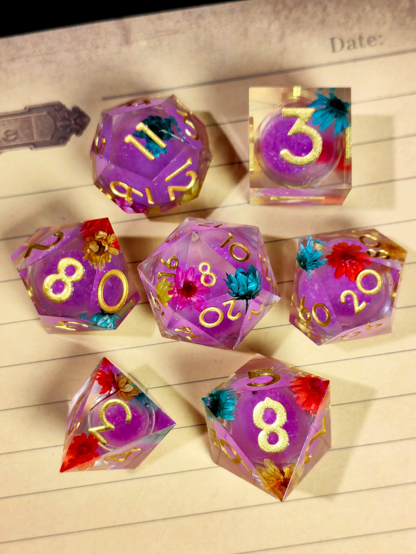 7 Piece Sharp Edge Resin Dice, Orange Sand Butterfly, Transparent with Green Numbers