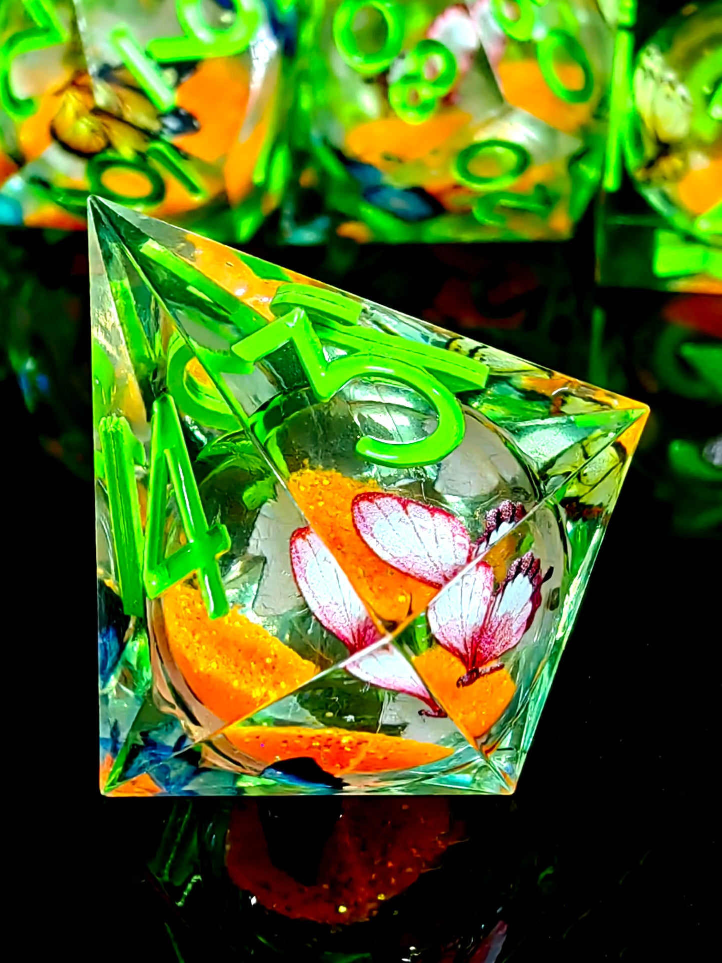 7 Piece Sharp Edge Resin Dice, Orange Sand Butterfly, Transparent with Green Numbers